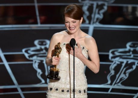 Julianne Moore takes home the Oscar for Best Actress for her emotional turn in Still Alice (2014)